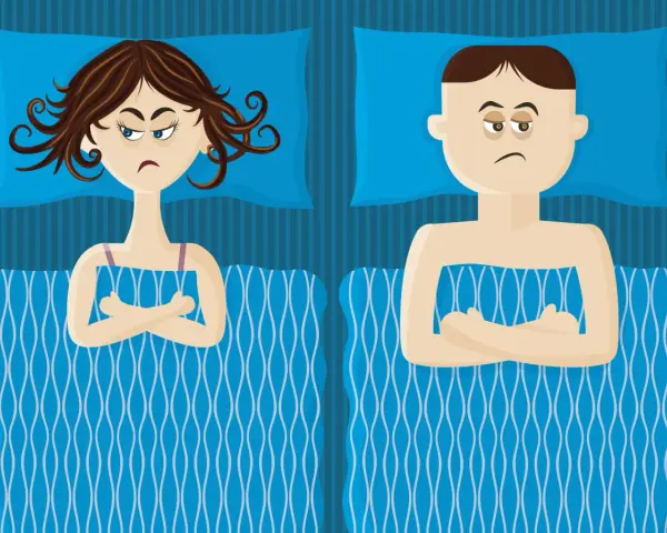 Couple au lit, bras croisés, l'air boudeur. Elle semble vouloir se faire désirer après avoir couché, lui est visiblement contrarié.