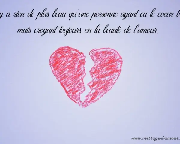 Un cœur rouge brisé, symbole d'être blessé par quelqu'un qu'on aime, mais qui garde espoir en l'amour.